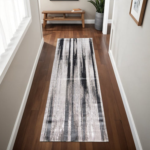 4' X 6' Black Silver and Gray Abstract Power Loom Area Rug